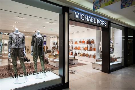 which is more expensive tommy hilfiger or michael kors|best stores like michael kors.